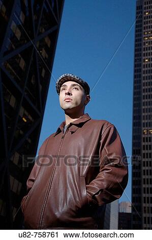 Portrait of a young man in an urban setting at dusk, San Francisco, California, USA View Large Photo Image Stock Image - Portrait of a young man in an urban setting at dusk, San Francisco, California, USA. Fotosearch