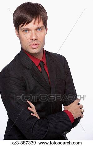 Stock Photo - portrait of a young man in studio. Fotosearch