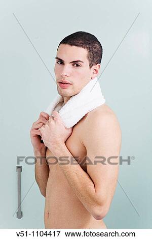 Portrait of a young man in the bathroom View Large Photo Image Stock Photo - Portrait of a young man in the bathroom. Fotosearch