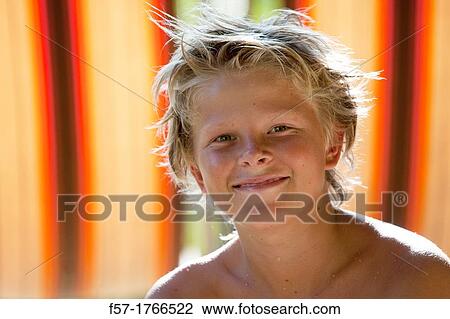 Portrait of a young teenage boy View Large Photo Image Stock Image - Portrait of a young teenage boy. Fotosearch