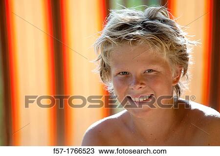 Stock Image - Portrait of a young teenage boy. Fotosearch