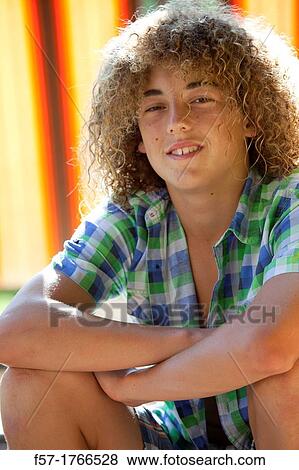 Portrait of a young teenage boy View Large Photo Image Stock Photo - Portrait of a young teenage boy. Fotosearch