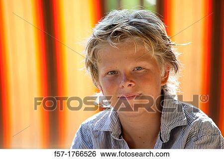 Portrait of a young teenage boy View Large Photo Image Stock Photograph - Portrait of a young teenage boy. Fotosearch