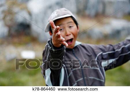 Portrait of a young teenager in the small village of Itilleq, Greenland View Large Photo Image Stock Image - Portrait of a young teenager in the small village of Itilleq, Greenland. Fotosearch