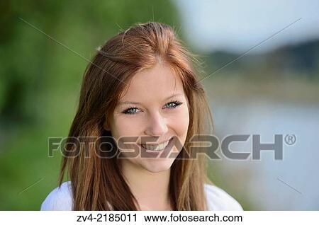 Portrait of a young woman in spring. View Large Photo Image Stock Image - Portrait of a young woman in spring.. Fotosearch
