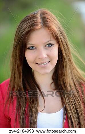 Stock Photo - Portrait of a young woman in spring.. Fotosearch