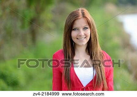 Portrait of a young woman in spring. View Large Photo Image Stock Photo - Portrait of a young woman in spring.. Fotosearch