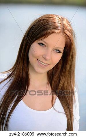 Portrait of a young woman in spring. View Large Photo Image Stock Photo - Portrait of a young woman in spring.. Fotosearch