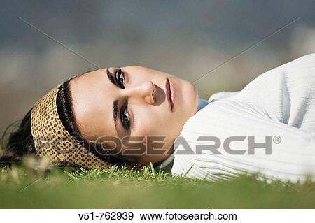 Portrait of a young woman in the countryside View Large Photo Image Stock Photo - Portrait of a young woman in the countryside. Fotosearch
