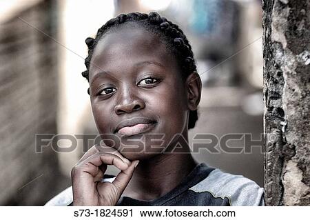 Portrait of a young woman, Maputo, Mozambique, Africa View Large Photo Image Stock Image - Portrait of a young woman, Maputo, Mozambique, Africa. Fotosearch