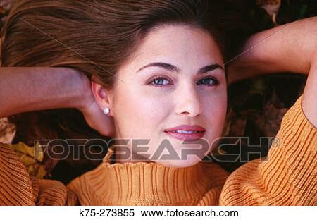 portrait of a young woman outdoors View Large Photo Image Stock Photography - portrait of a young woman outdoors. Fotosearch