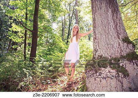 portrait of a young woman portrait in the forest near Coburg, Germany. View Large Photo Image Stock Photo - portrait of a young woman portrait in the forest near Coburg, Germany.. Fotosearch