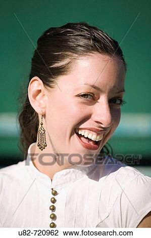 Stock Image - Portrait of a young woman. Fotosearch
