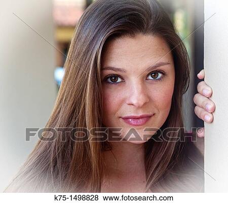 Portrait of a young woman View Large Photo Image Stock Photo - Portrait of a young woman. Fotosearch