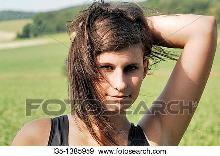 Portrait of a young woman, Summer, Germany View Large Photo Image Stock Photo - Portrait of a young woman, Summer, Germany. Fotosearch