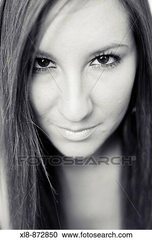Stock Image - Portrait of a young women, fashion. Fotosearch