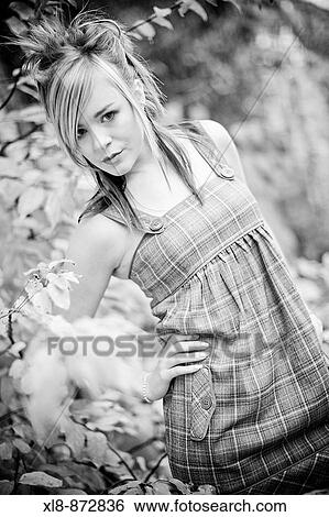 Stock Photograph - Portrait of a young women, fashion. Fotosearch