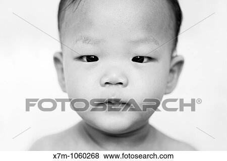 Stock Photo - Portrait of an 11-month old Korean baby boy. Fotosearch