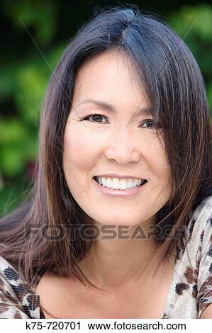 Stock Image - Portrait of an Asian American woman. Fotosearch