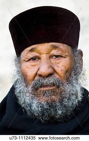 Portrait of an Ethiopian orthodox priest taken during his pilgrimage in Jerusalem. View Large Photo Image Stock Photography - Portrait of an Ethiopian orthodox priest taken during his pilgrimage in Jerusalem.. Fotosearch