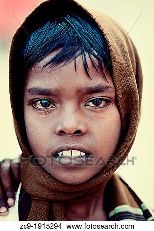 Portrait of an indian boy Varanasi, Benares, Uttar Pradesh, India View Large Photo Image Picture - Portrait of an indian boy Varanasi, Benares, Uttar Pradesh, India. Fotosearch