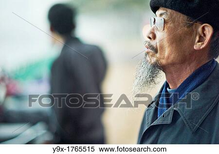 Portrait of an old man with a long beard wearing sunglasses and a beret View Large Photo Image Stock Photography - Portrait of an old man with a long beard wearing sunglasses and a beret. Fotosearch
