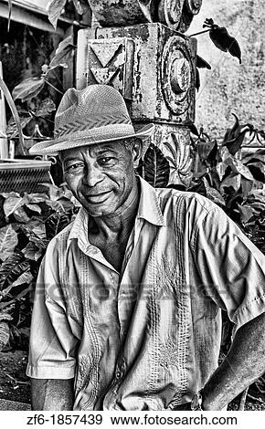 Portrait of attractive man in straw hat in downtown Havana Cuba View Large Photo Image Stock Photo - Portrait of attractive man in straw hat in downtown Havana Cuba. Fotosearch
