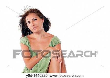 Stock Image - Portrait of attractive mature hispanic woman. Fotosearch
