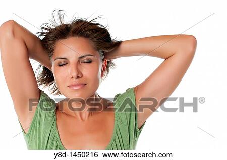 Stock Photograph - Portrait of attractive mature hispanic woman relaxing with eyes closed. Fotosearch