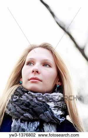 Stock Image - Portrait of beautiful woman in autumn. Fotosearch