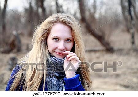 Portrait of beautiful woman in autumn View Large Photo Image Stock Photo - Portrait of beautiful woman in autumn. Fotosearch