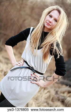 Stock Photography - Portrait of beautiful woman in autumn. Fotosearch