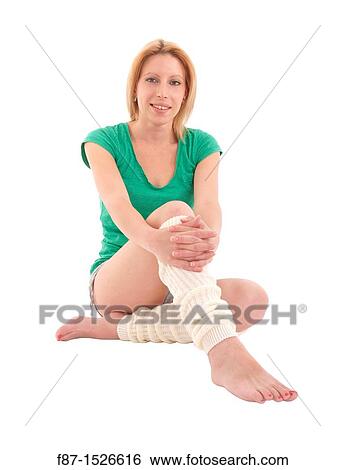 Portrait of beautiful young woman relaxing after fitness, isolated on white View Large Photo Image Stock Photograph - Portrait of beautiful young woman relaxing after fitness, isolated on white. Fotosearch