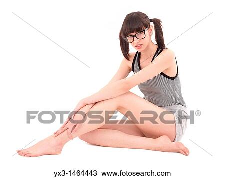 Portrait of beautiful young woman with glasses relaxing after fitness, isolated on white View Large Photo Image Stock Image - Portrait of beautiful young woman with glasses relaxing after fitness, isolated on white. Fotosearch