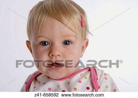 Stock Image - Portrait of blond little girl. Fotosearch
