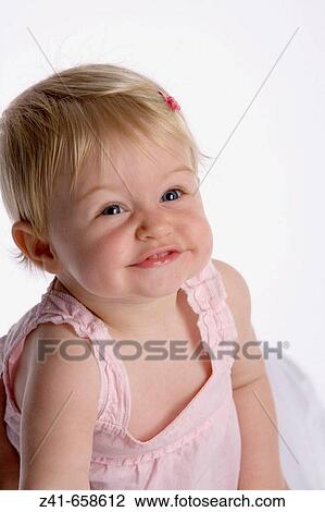 Portrait of blond little girl View Large Photo Image Stock Image - Portrait of blond little girl. Fotosearch