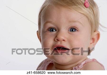 Stock Image - Portrait of blond little girl. Fotosearch