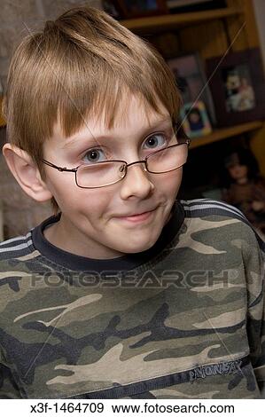 Portrait of boy age 11 with a Harry Potter look-alike View Large Photo Image Stock Photo - Portrait of boy age 11 with a Harry Potter look-alike. Fotosearch