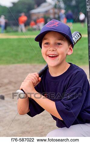 Portrait of boy at little league baseball game. View Large Photo Image Stock Image - Portrait of boy at little league baseball game.. Fotosearch
