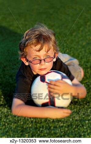 Portrait of boy with soccer ball View Large Photo Image Stock Image - Portrait of boy with soccer ball. Fotosearch