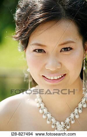 Picture - Portrait of bride smiling, close-up. Fotosearch