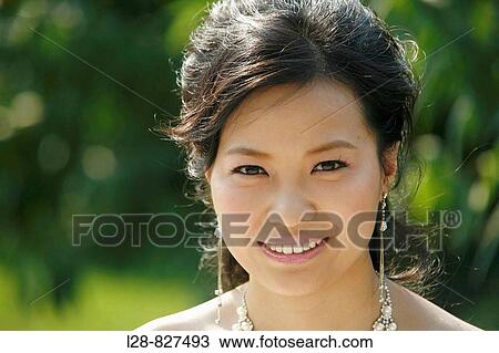 Stock Image - Portrait of bride smiling, close-up. Fotosearch