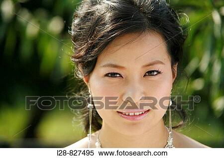 Stock Photography - Portrait of bride smiling, close-up. Fotosearch
