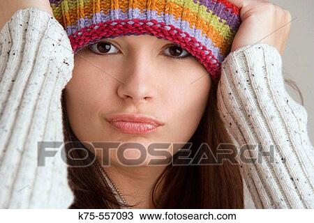 Portrait of caucasian-hispanic woman in her twenties with cap. View Large Photo Image Stock Image - Portrait of caucasian-hispanic woman in her twenties with cap.. Fotosearch