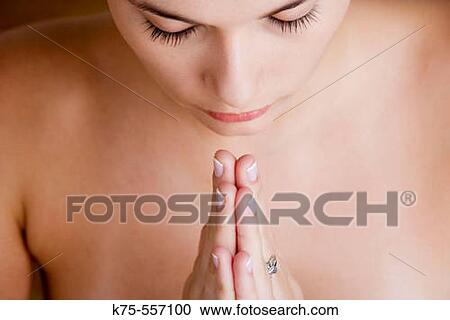 Stock Image - Portrait of caucasian-hispanic woman in her twenties.. Fotosearch