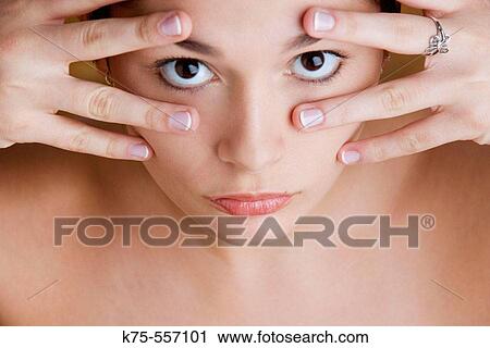 Stock Image - Portrait of caucasian-hispanic woman in her twenties.. Fotosearch