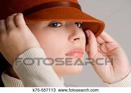 Portrait of caucasian-hispanic woman in her twenties with a hat. View Large Photo Image Stock Image - Portrait of caucasian-hispanic woman in her twenties with a hat.. Fotosearch