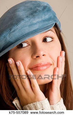 Portrait of caucasian-hispanic woman in her twenties with blue suede cap.. View Large Photo Image Stock Photo - Portrait of caucasian-hispanic woman in her twenties with blue suede cap... Fotosearch