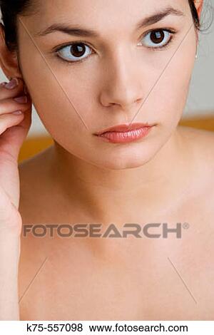 Stock Photo - Portrait of caucasian-hispanic woman in her twenties.. Fotosearch