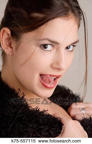 Stock Photography - Portrait of caucasian-hispanic woman in her twenties.. Fotosearch
